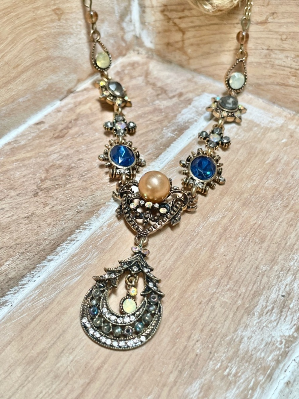 Vintage-Inspired Antique Gold Necklace with Blue Crystals and Champagne Pearl